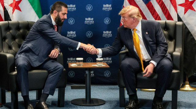 דונלד טראמפ, אחמד א-שרע (צילום: REUTERS/Jonathan Ernst)