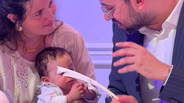 אלמנתו ובנו סרן שחר נתנאל בוזגלו ז"ל (צילום: פרטי)