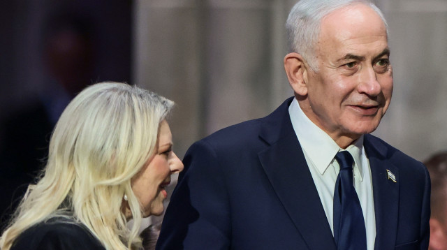 ראש הממשלה בנימין נתניהו ורעייתו שרה בטקס האשכבה של לינדזי גרהאם (צילום: רויטרס)