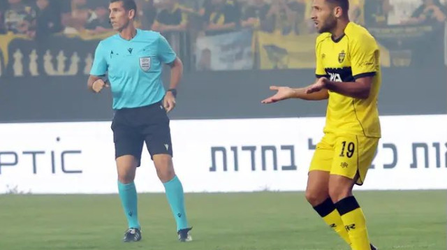 כבר ראה את הכדור בפנים. שון וייסמן (צילום: אודי ציטיאט)