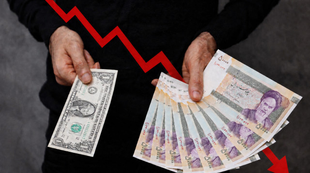 ריאל איראני מול דולר (צילום: Majid Asgaripour/WANA (West Asia News Agency) via REUTERS)