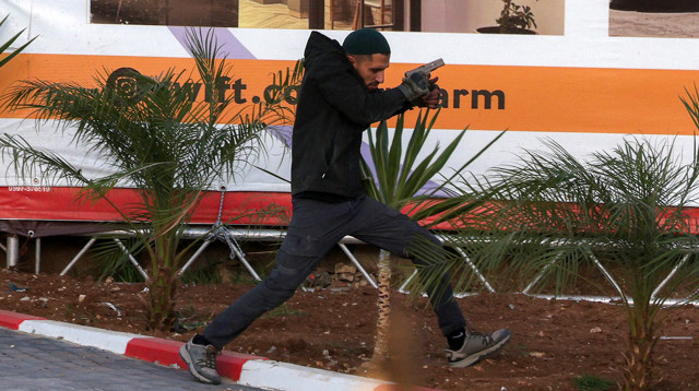 אחד המחבלים מהפיגוע בצומת יהודה (צילום: HAZEM BADER / AFP via Getty Images)