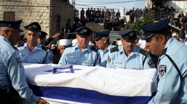 הלווית השוטר רס"מ זידאן סיף שנהרג בפיגוע בבית הכנסת (צילום: דוברות המשטרה)