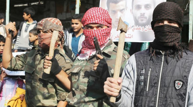 חגיגות שמחה של הפלסטינים אחרי הפיגוע בירושלים 18.11.14 (צילום: רויטרס)