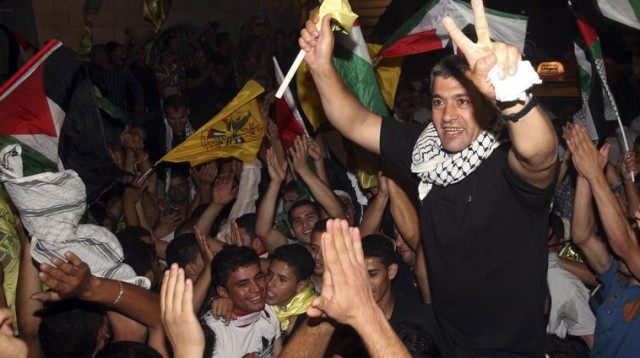 שחרור מחבלים פלסטינים (צילום: רויטרס)