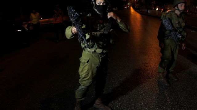 חיילים בפעילות לילית (צילום: רויטרס)