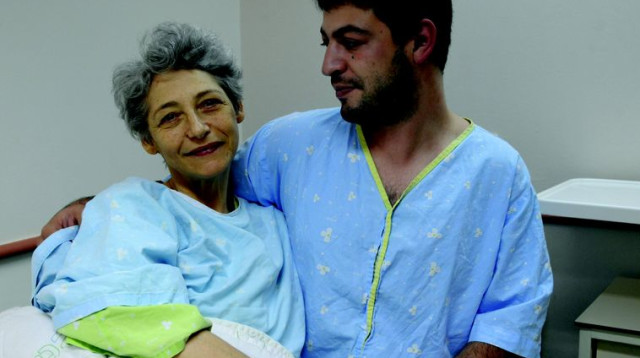 טטיאנה דובינטקייה ובנה  (צילום: אבשלום ששוני)