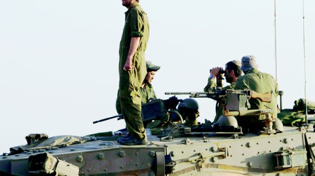 חיילי מילואים בצוק איתן (למצולמים אין קשר לכתבה) (צילום: רויטרס)