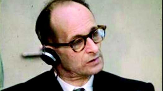 אדולף אייכמן במהלך משפטו  (צילום: ארכיון התמונות הלאומי)