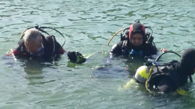 צוללנים במאגר המים יתיר  (צילום: חטיבת דובר המשטרה)