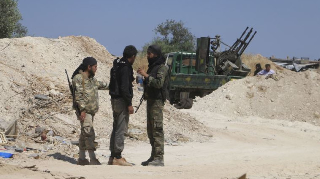 מורדים במחוז אידליב בסוריה (צילום: רויטרס)