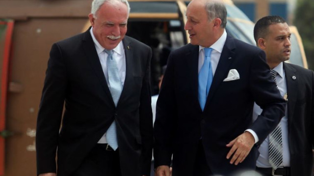 לורן פביוס ומחמוד עבאס (צילום: פלאש 90)