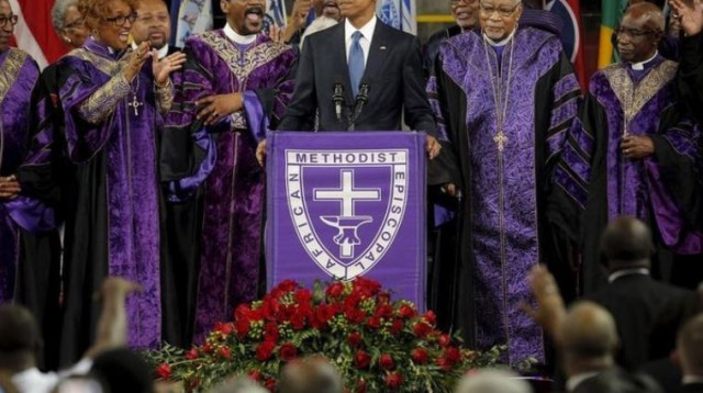 אובמה בטקס לזכר הקורבנות בטבח בכנסייה בצ'רלסטון (צילום: רויטרס)