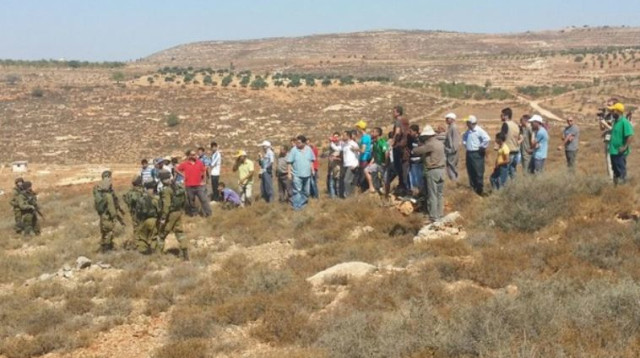 עימותים בין מתנחלים לפלסטינים באש קודש (צילום: סוכנות תצפית)