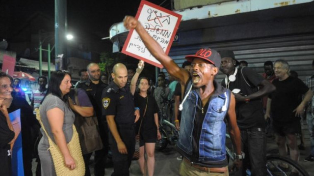 עימותים בין מסתננים למפגינים בת"א (צילום: אבשלום ששוני)