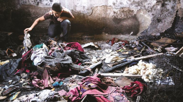 זירת הפיגוע בכפר דומא (צילום: מרים אלסטר, פלאש 90)