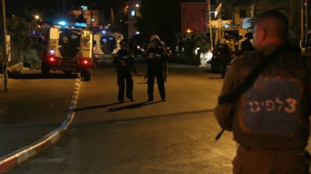 זירת הפיגוע בכביש המנהרות  (צילום: הלל מאיר, סוכנות תצפית)