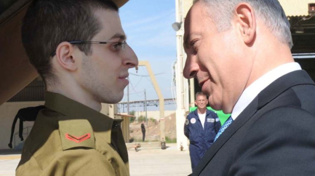 גלעד שליט ובנימין נתניהו  (צילום: אבי אוחיון, לע"מ)