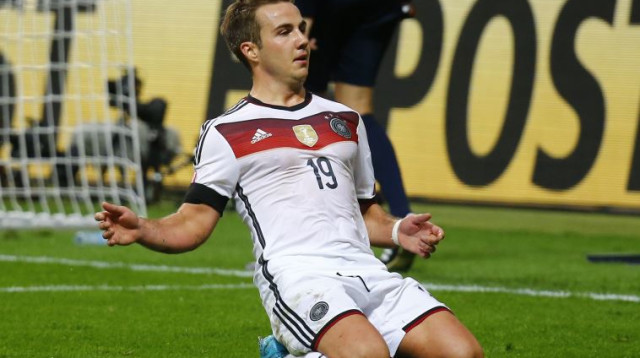 מריו גצה חוגג על פולין (צילום: רויטרס)