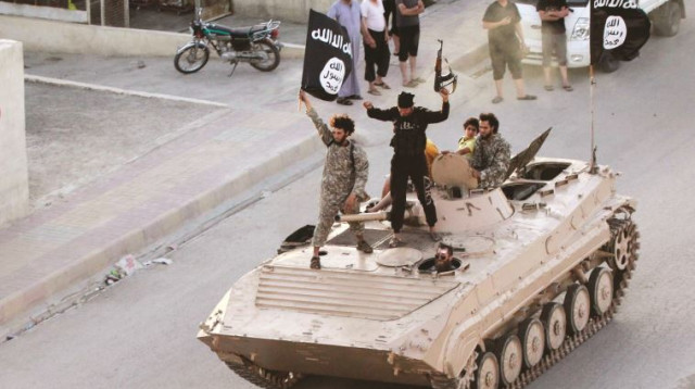 אנשי דאעש בסוריה (צילום: רויטרס)