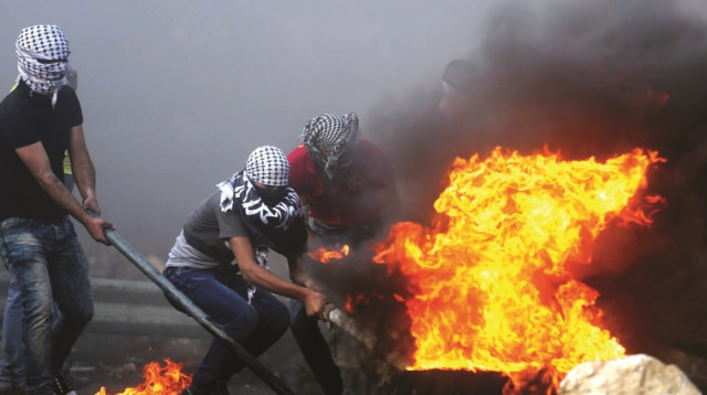 מהומות בין פלסטינים לכוחות צה"ל (צילום: פלאש 90)