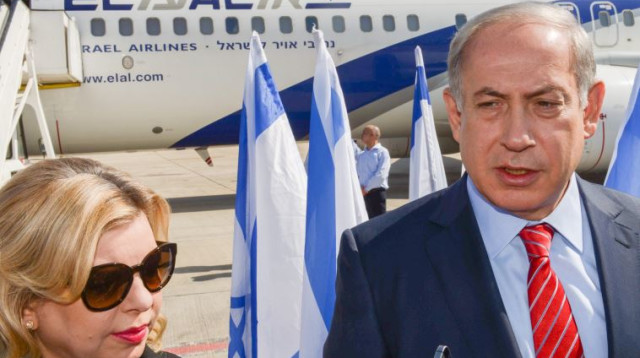 בנימין ושרה נתניהו לפני ההמראה לברלין (צילום: עמוס בן גרשום, לע"מ)