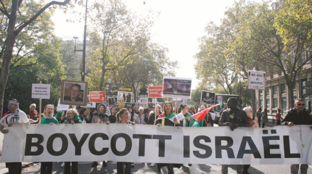 הפגנה של תנועת ה-BDS נגד ישראל (צילום: AFP)