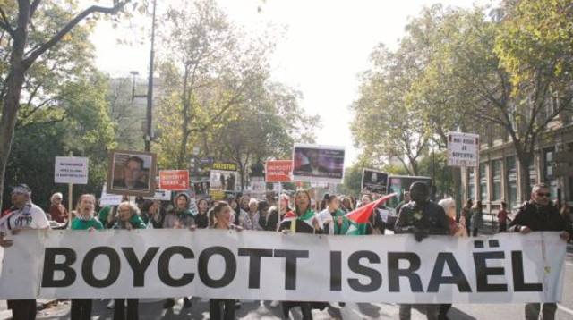 הפגנה של תנועת ה-BDS נגד ישראל (צילום: AFP)