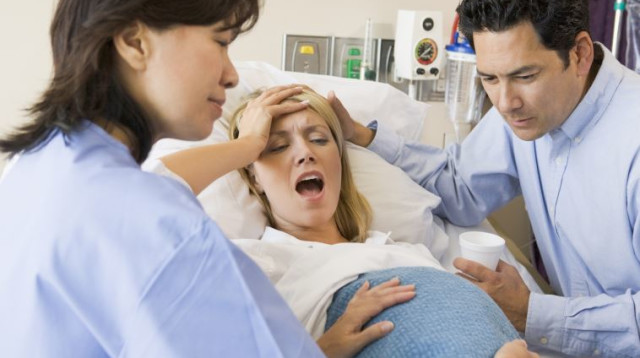 אשה יולדת (צילום: אינגאימג)