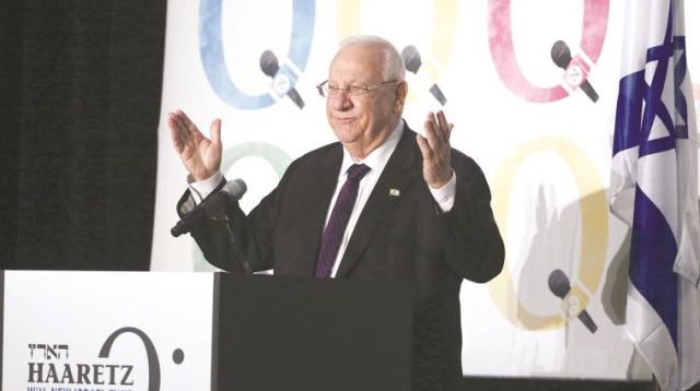 ריבלין, השבוע בוועידת השלום של ״הארץ״. הנשיא הפך את עצמו ואותנו לרודפי שלום, בלי שנצטרך לשלם את המחי (צילום: רויטרס)