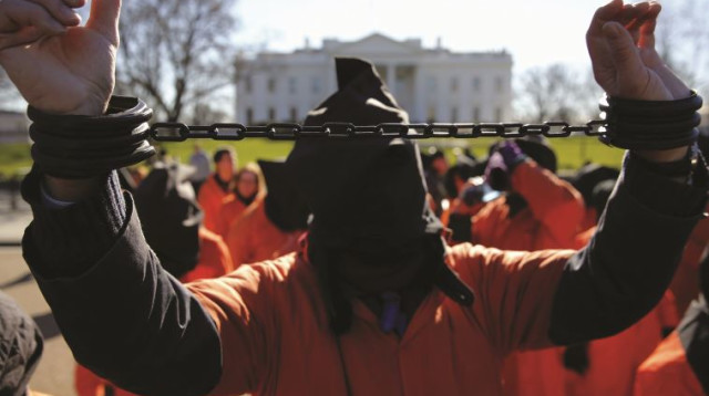 הפגנה של ארגוני זכויות אדם מול הבית הלבן (צילום: רויטרס)