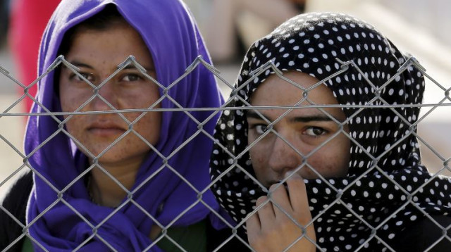 נשים יזידיות שנמלטו מדאעש (צילום: רויטרס)