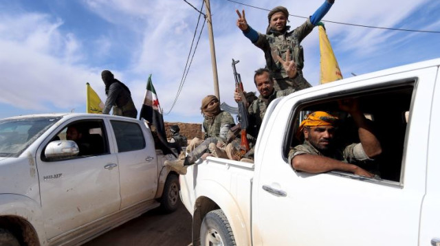 גורמי אופוזיציה סורים כבשו את העיירה אל שדאדי, 19.2.16 (צילום: רויטרס)