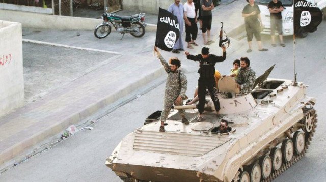 כוחות דאעש בפעולה (צילום: רויטרס)