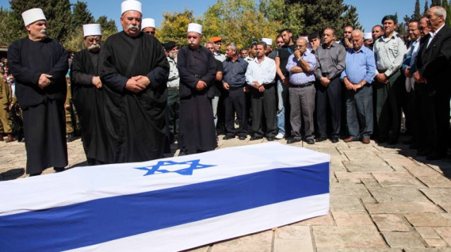 משפחתו של החייל מג'די חלבי בהלווייתו, 2012 (צילום: אבישג שאר ישוב, פלאש 90)