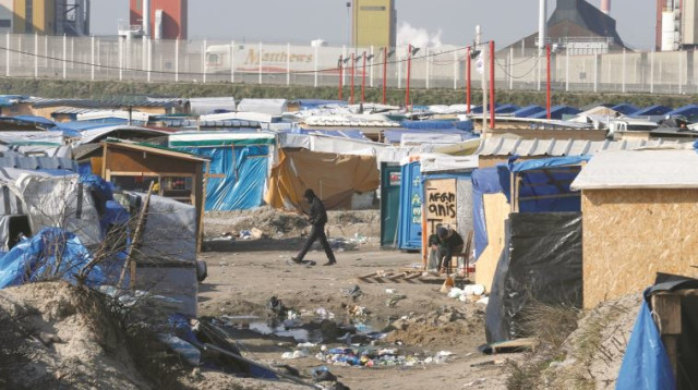 כ־4,000 פליטים מכל העולם. “ג'ונגל המהגרים" בקאלה, צרפת  (צילום: רויטרס)
