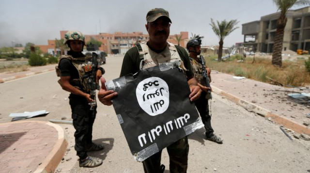 כוחות מיוחדים של צבא עיראק לאחר כיבוש בית החולים של פלוג'ה (צילום: רויטרס)