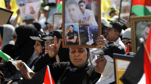 הפגנה למען האסירים הפלסטיניים (צילום: רויטרס)