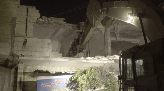 הרסית בית המחבל שסייע לפיגוע בו נרצחה הדר כהן ז"ל (צילום: דובר צה"ל)