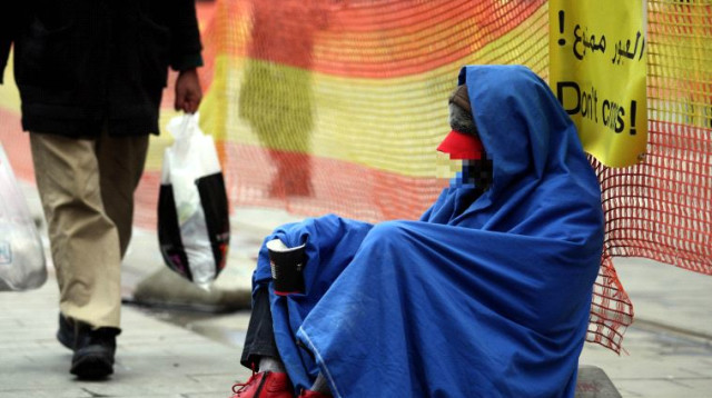 קבצן, ארכיון (צילום: אביר סולטן, פלאש 90)