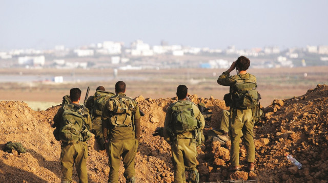 חיילים במהלך צוק איתן (צילום: רויטרס)