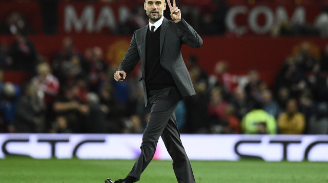 פפ גווארדיולה (צילום: AFP)