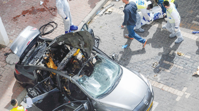 זירת החיסול של שמוליק דוד ואלכס לרנר בראשון לציון (צילום: רוני שיצר, באדיבות פוסטה)