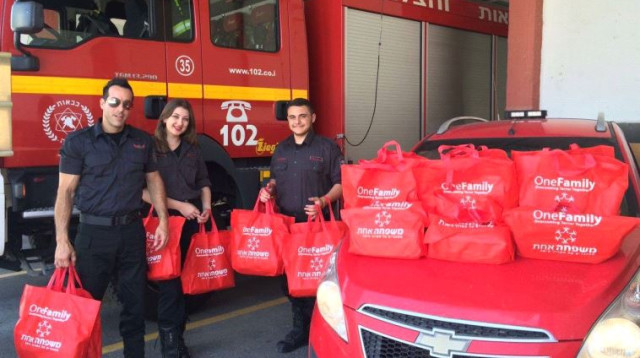 אדי שטרן, ניקול גולוב ודוד בר ששת (צילום: כבאות והצלה מחוז צפון)