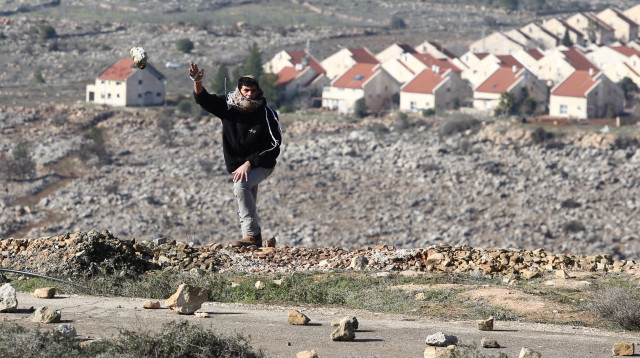 ידויי אבנים בעמונה (צילום: מרק ישראל סלם)