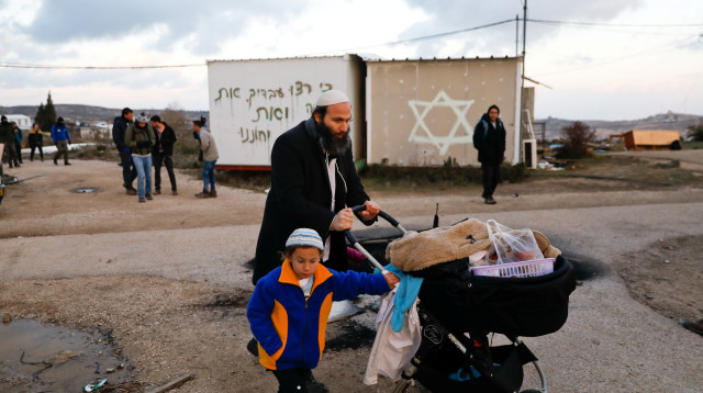 פינוי עמונה (צילום: רויטרס)