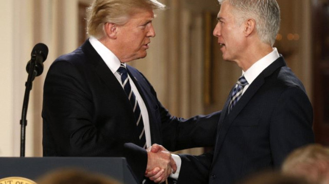 ניל גורסץ' דונלד טראמפ (צילום: רויטרס)