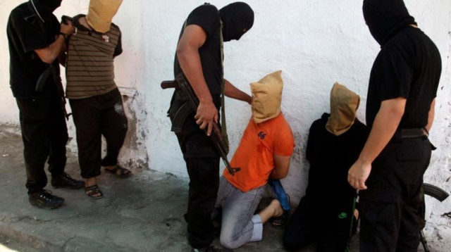 מעצר של משתפי פעולה על ידי חמאס (צילום: רויטרס)