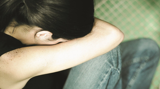 בחורה בדיכאון (צילום: אינג אימג')