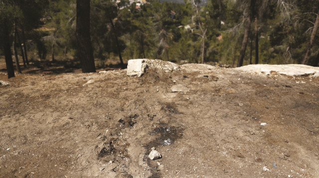 זירת הרצח של מוחמד אבו ח'דיר (צילום: יונתן זינדל, פלאש 90)